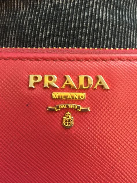 authentic vs fake prada wallet|authentic prada wallet sale.